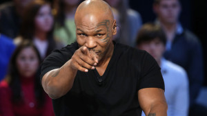 US Former heavyweight boxing champion Mike Tyson attends the TV show "Le Grand Journal" on the French television channel Canal Plus on December 9, 2013 in Paris.    AFP PHOTO / THOMAS SAMSON